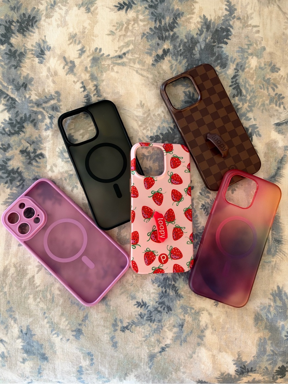 Assorted iPhone 16 Pro Max phone cases.